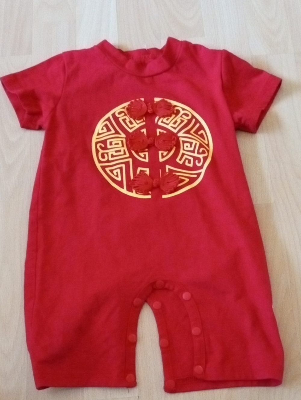 Red Kids One-Piece Romper with Gold Motif